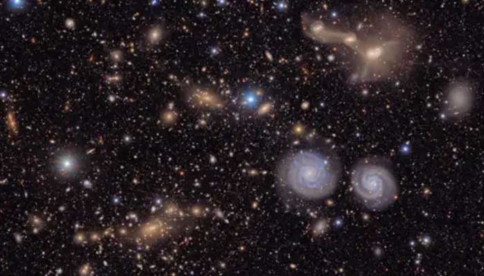 In just a small section of the Rubin Observatorys total view of the Virgo Cluster, bright stars shine in the foreground in front of many distant galaxies. — Vera C Rubin Observatory/AFP