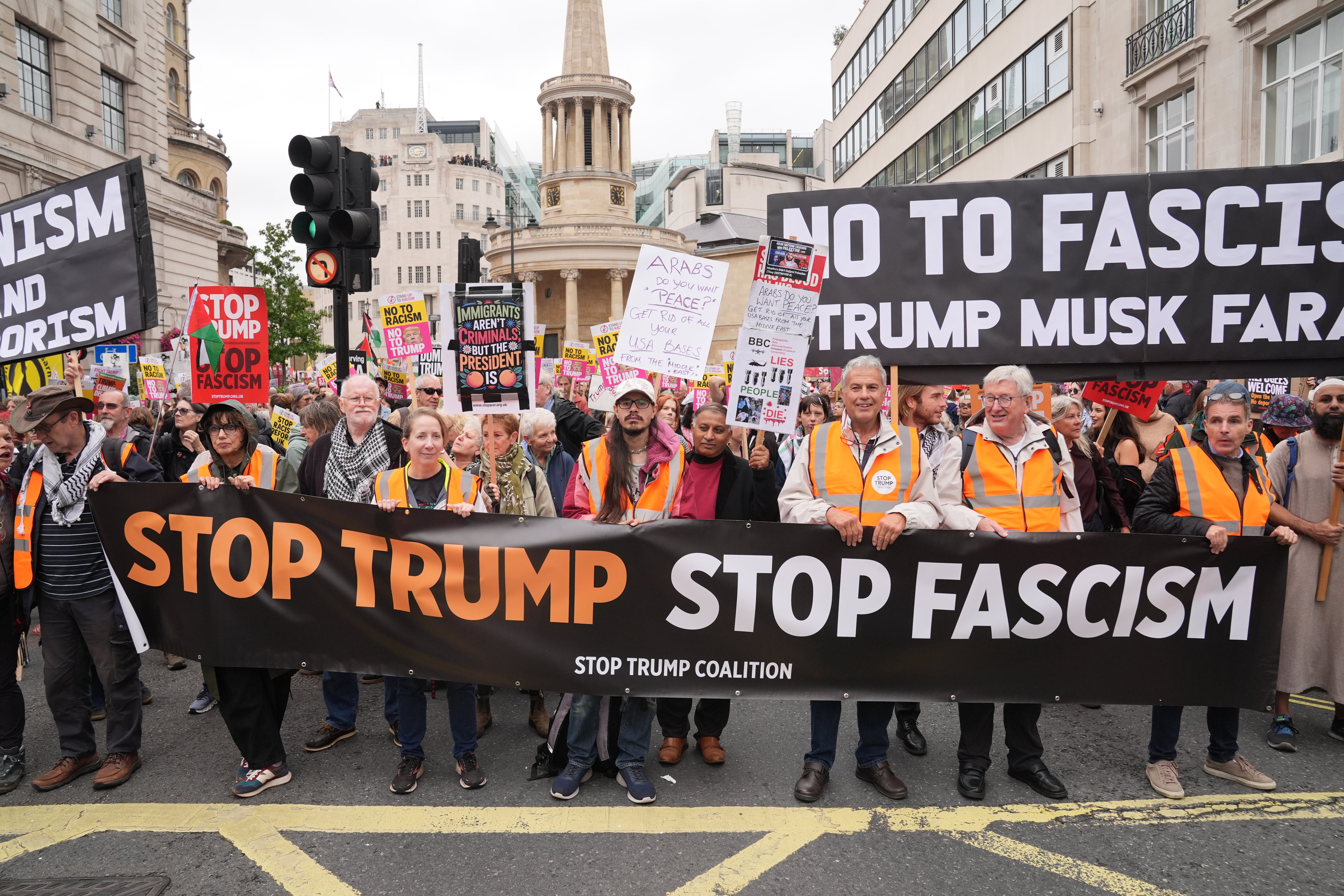 Stop Trump Coalition campaigners march in central London