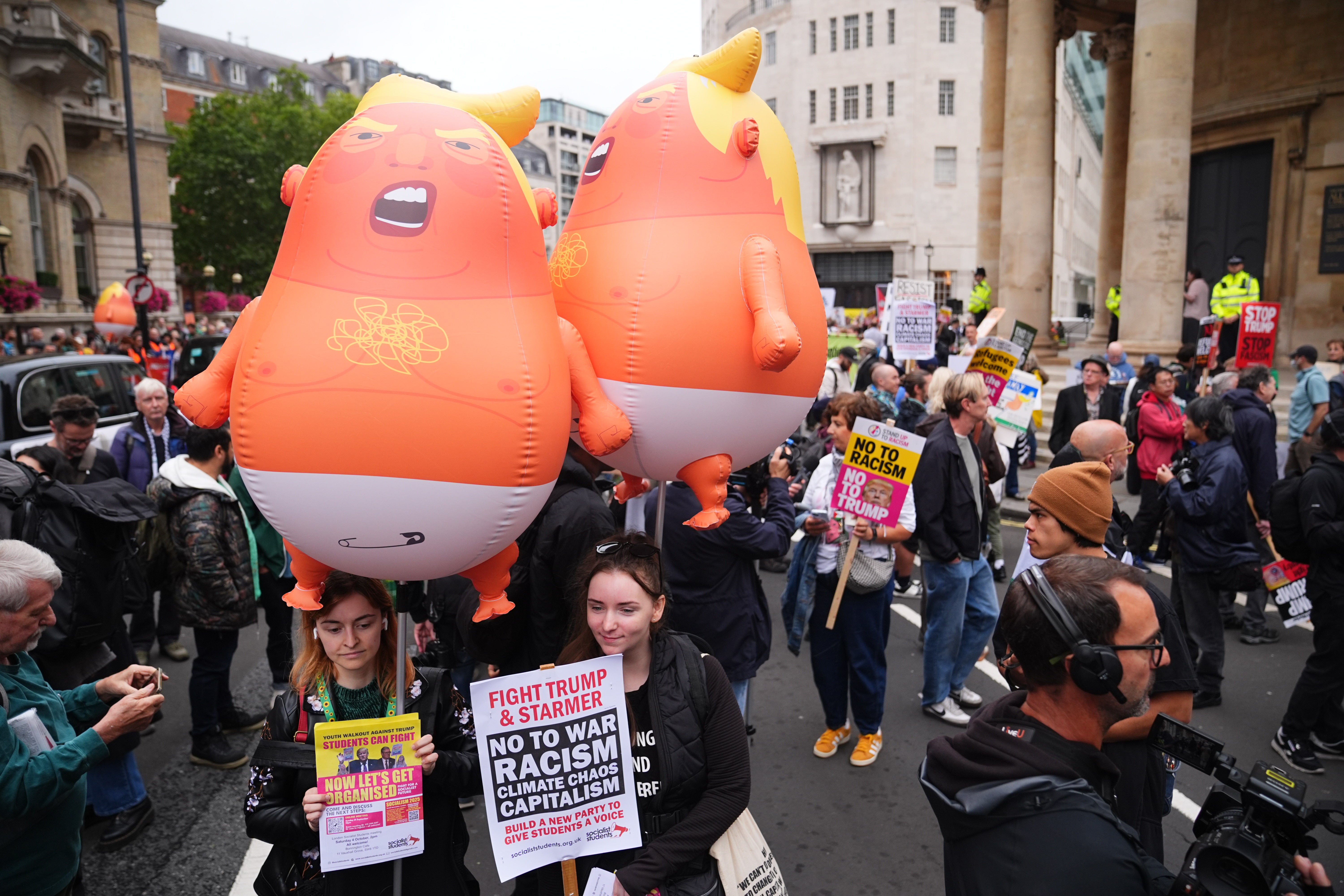 Demonstrators with placards and ‘orange blimp’ inflatables turned out in force in London